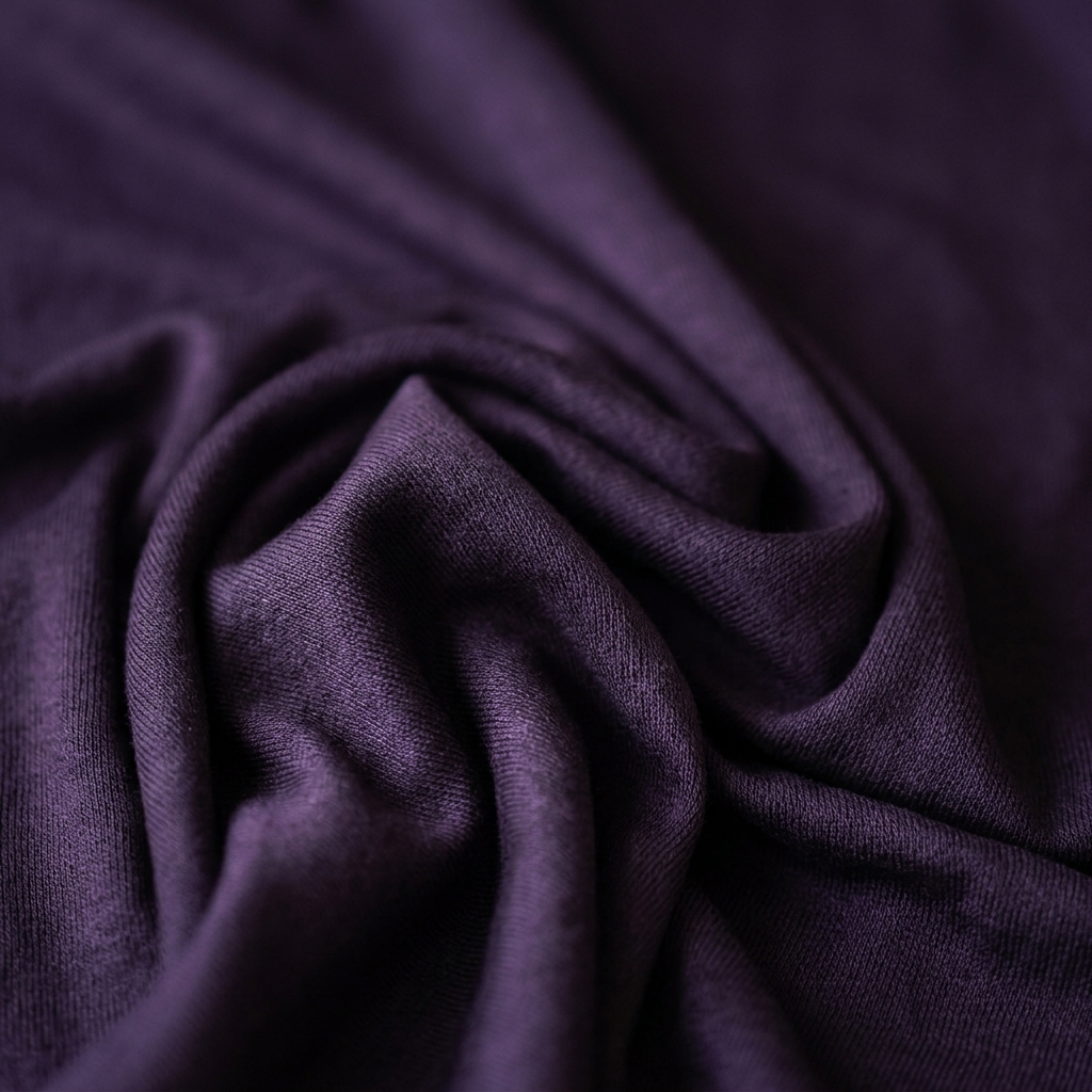 Silky draping viscose knit fabric texture